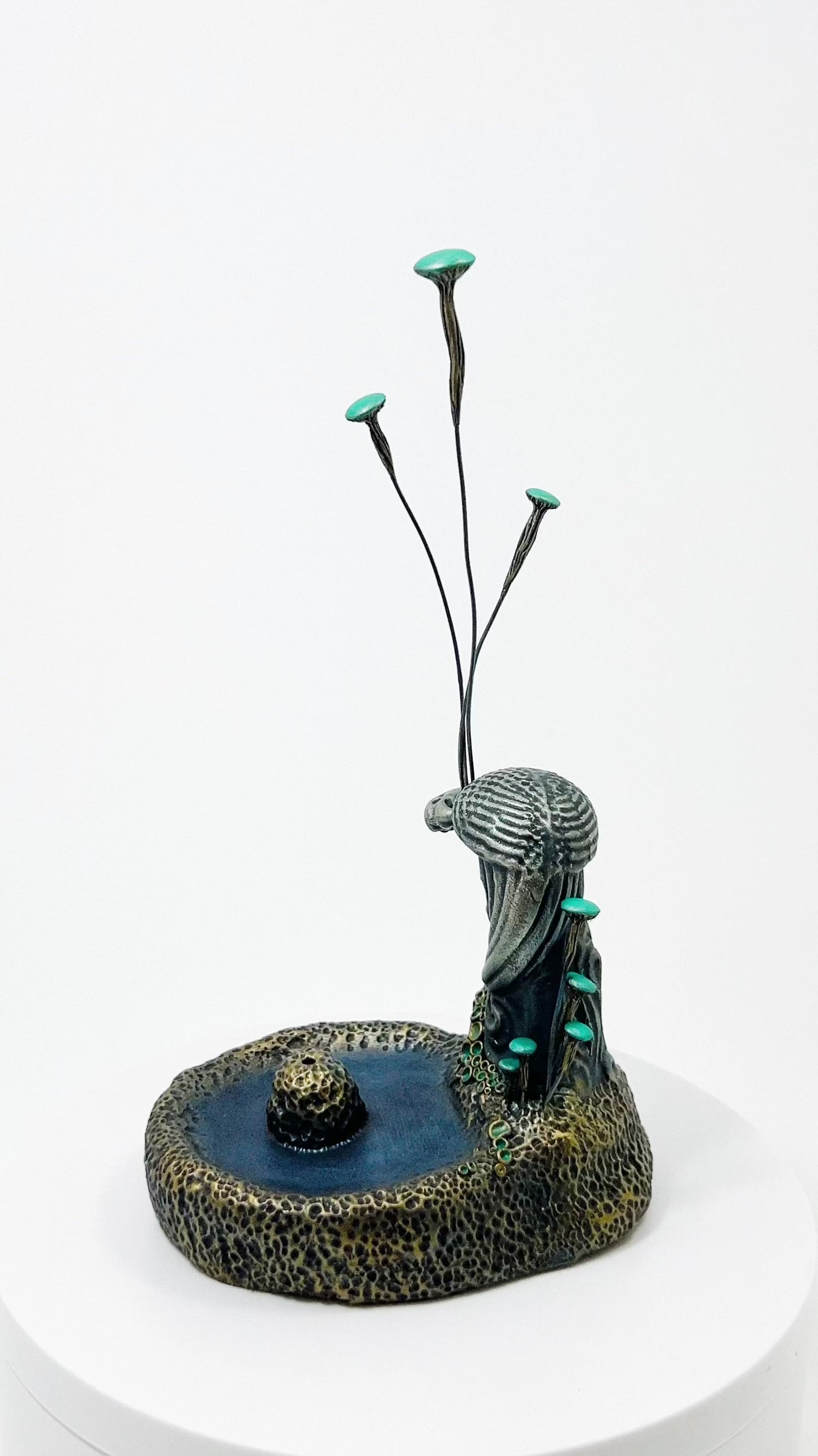 Silver-bronze bird incense holder spinning